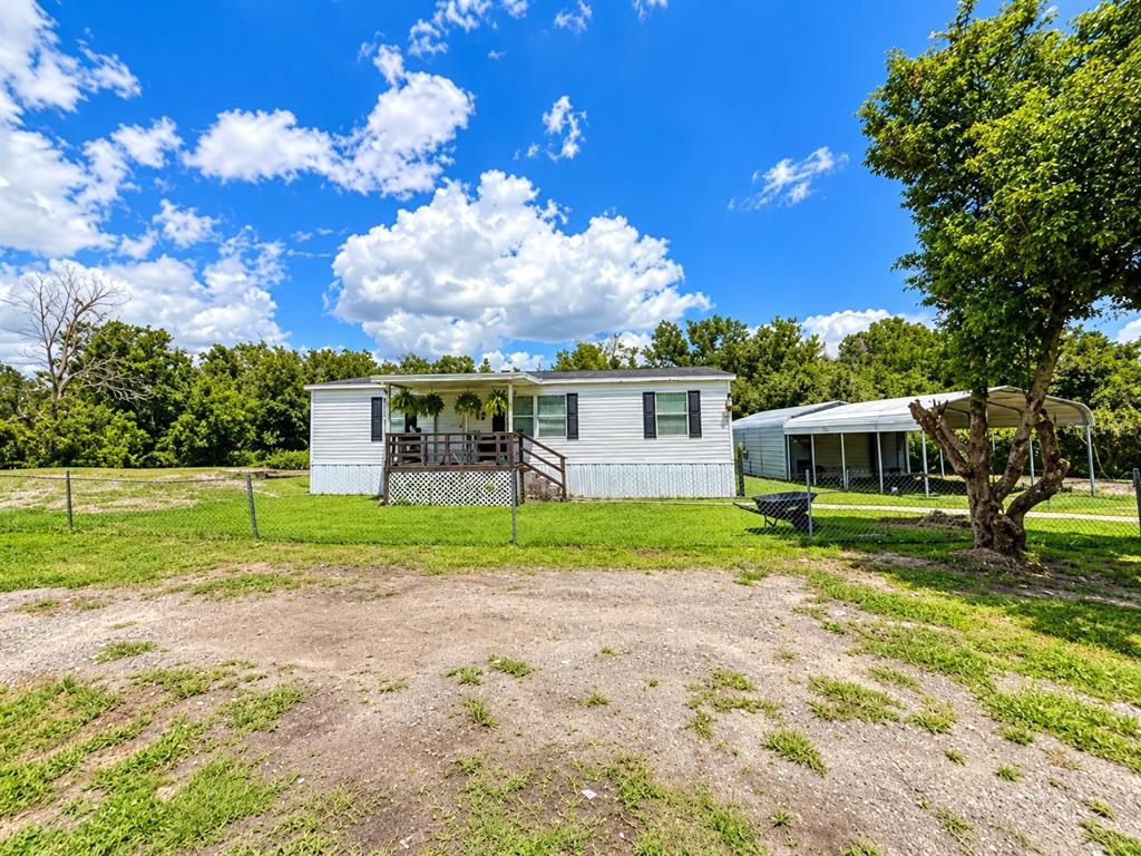 9027 HAMMOCK LOOP, POLK CITY, FL — photo 4 of 7