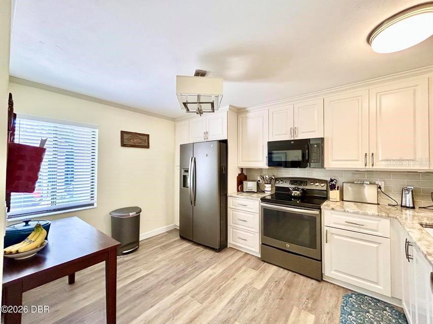 1 TOMOKA OAKS BOULEVARD UNIT 119, ORMOND BEACH, FL — photo 5 of 23