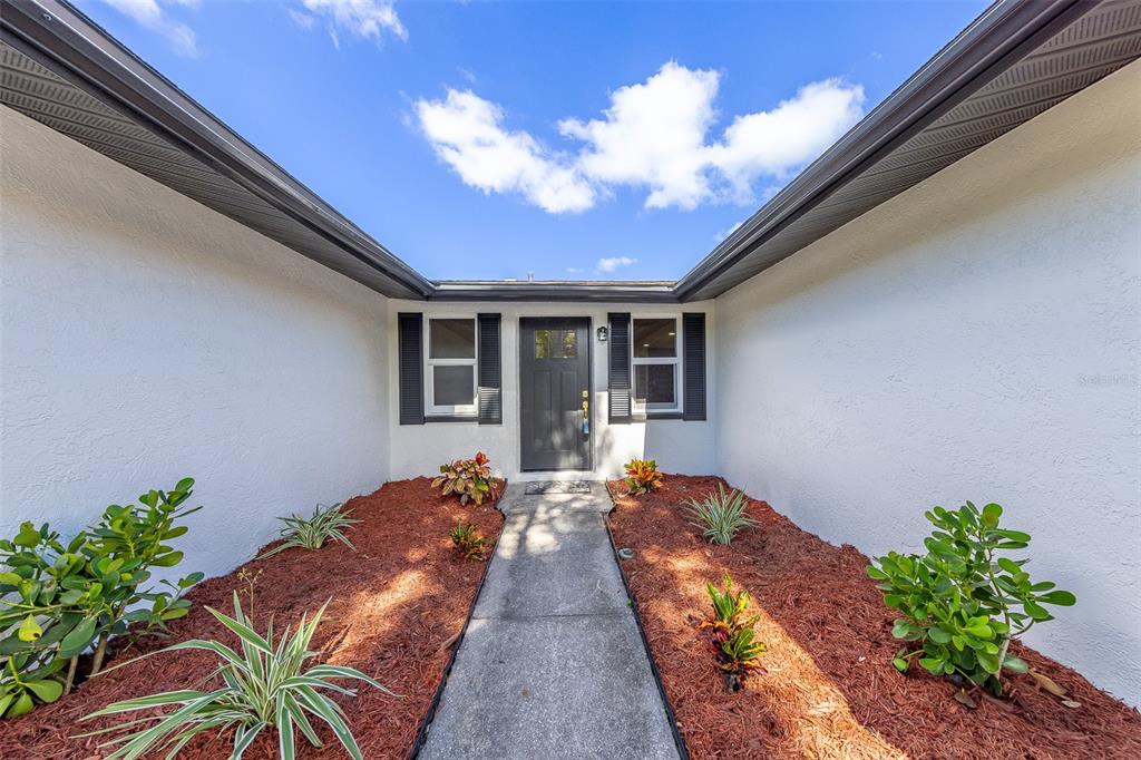 7149 CHANNELSIDE LANE N, PINELLAS PARK, FL — photo 2 of 56