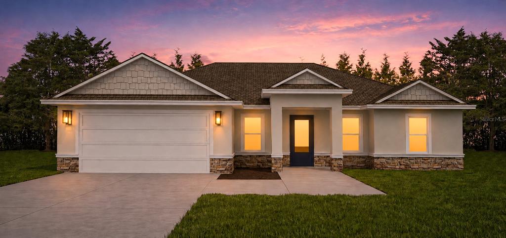 This is a rendering of a single-story house with a garage and stone accents — 12202 SW 90 PLACE, DUNNELLON, FL