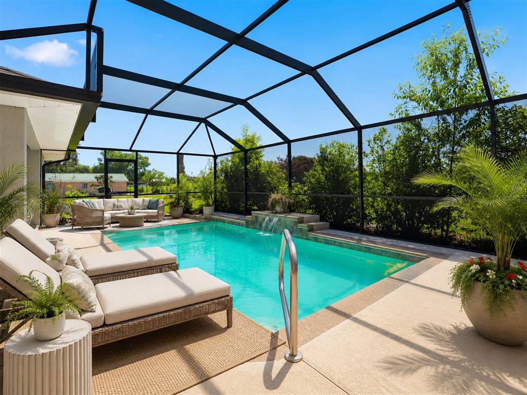 A screened-in patio features a swimming pool with a waterfall and lounge chairs — 12764 COUNTY ROAD 223, OXFORD, FL