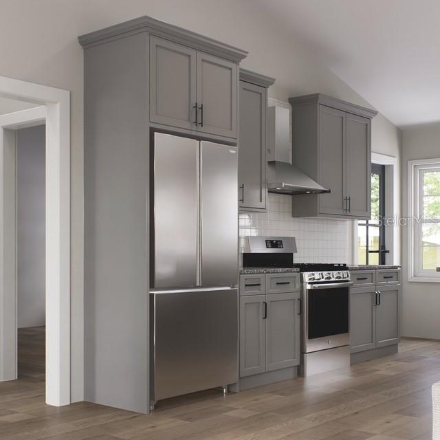 This rendering shows a modern kitchen with gray cabinets, stainless steel appliances, and wood flooring — 354 HOOT OWL ROAD, SATSUMA, FL