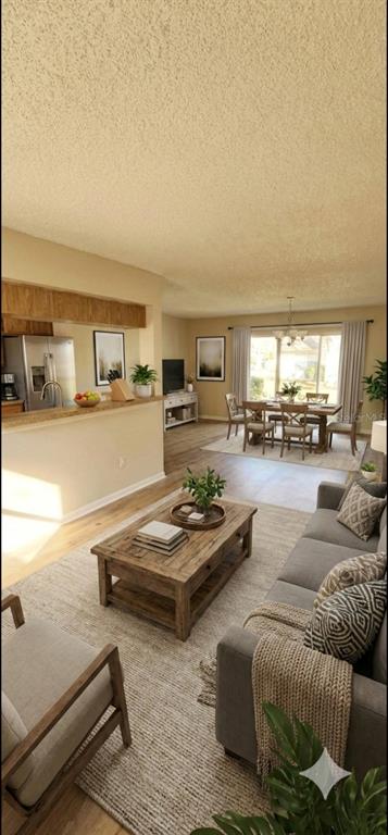 This is a digital rendering of an open-concept living room and dining area — 6050 SCOTCHWOOD GLEN UNIT 105, ORLANDO, FL