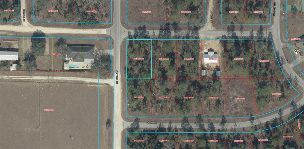 This is an aerial map showing residential lots, roads, and a single house with a pool — TBD NE 150TH AVENUE, WILLISTON, FL