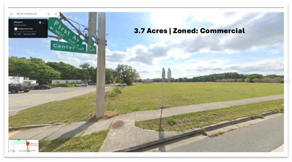 A vacant, grassy commercial lot is situated at the corner of First Avenue and Center Street — US-17 & 1ST STREET E, PIERSON, FL