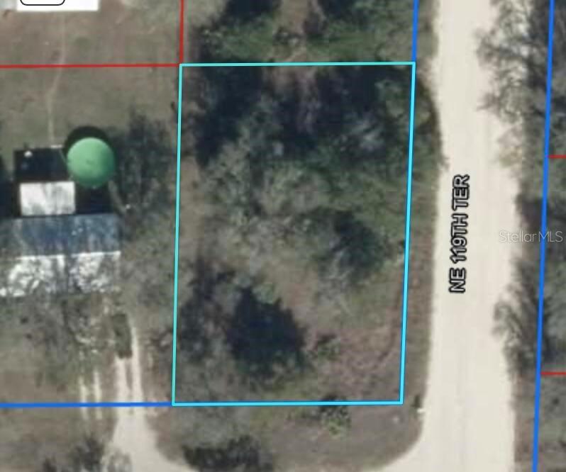 This is an aerial map view of a vacant, wooded rectangular lot — 0 NE 119TH TERRACE, WILLISTON, FL