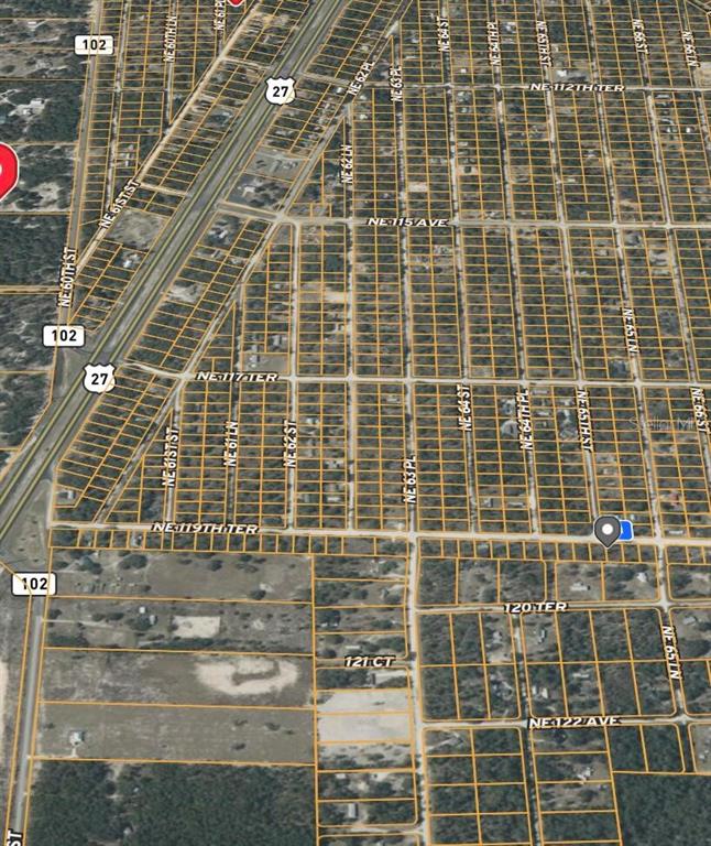 This is an aerial map showing a grid of residential land parcels near a highway — 0 NE 119TH TERRACE, WILLISTON, FL