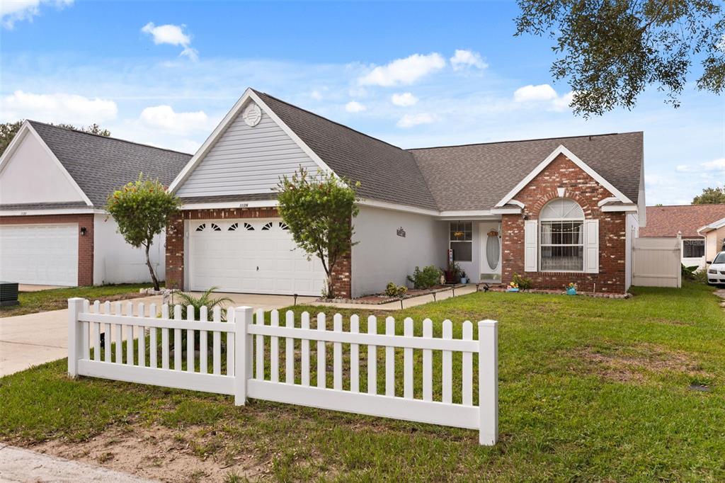 1126 WOODFLOWER WAY, CLERMONT, FL — photo 2 of 30
