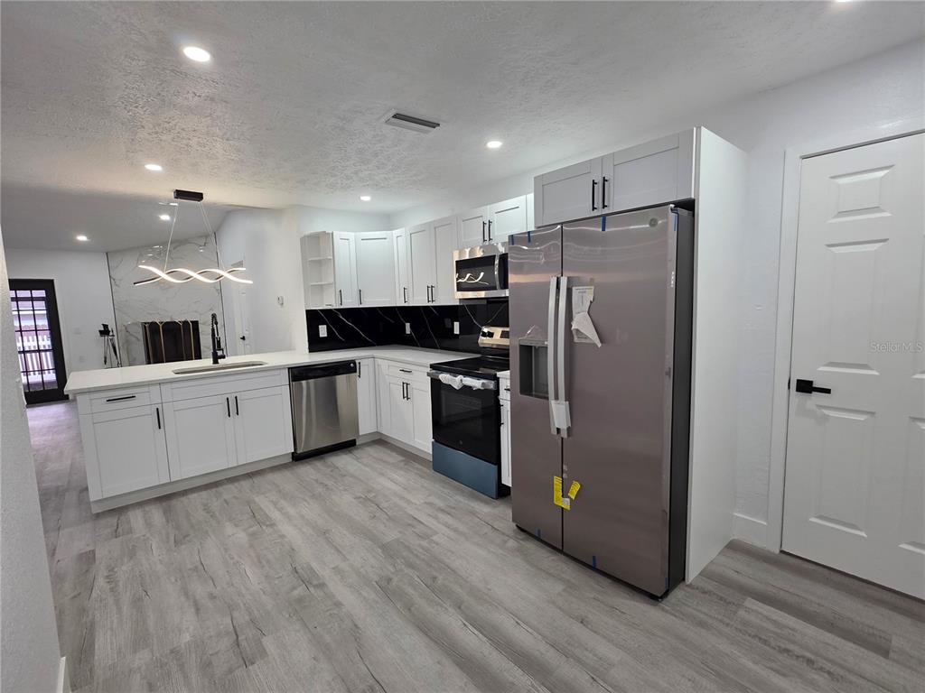 5044 ROANOKE DRIVE, HOLIDAY, FL — photo 4 of 20