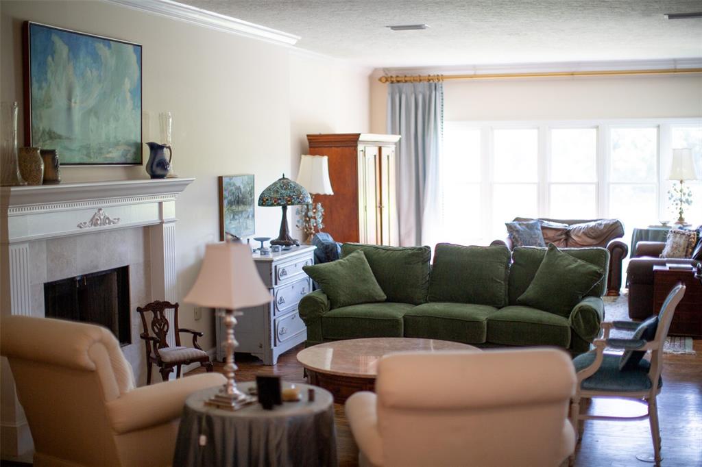 A kitchen with light blue cabinets, a wooden range hood, and a central island — 1211 61ST STREET NW, BRADENTON, FL