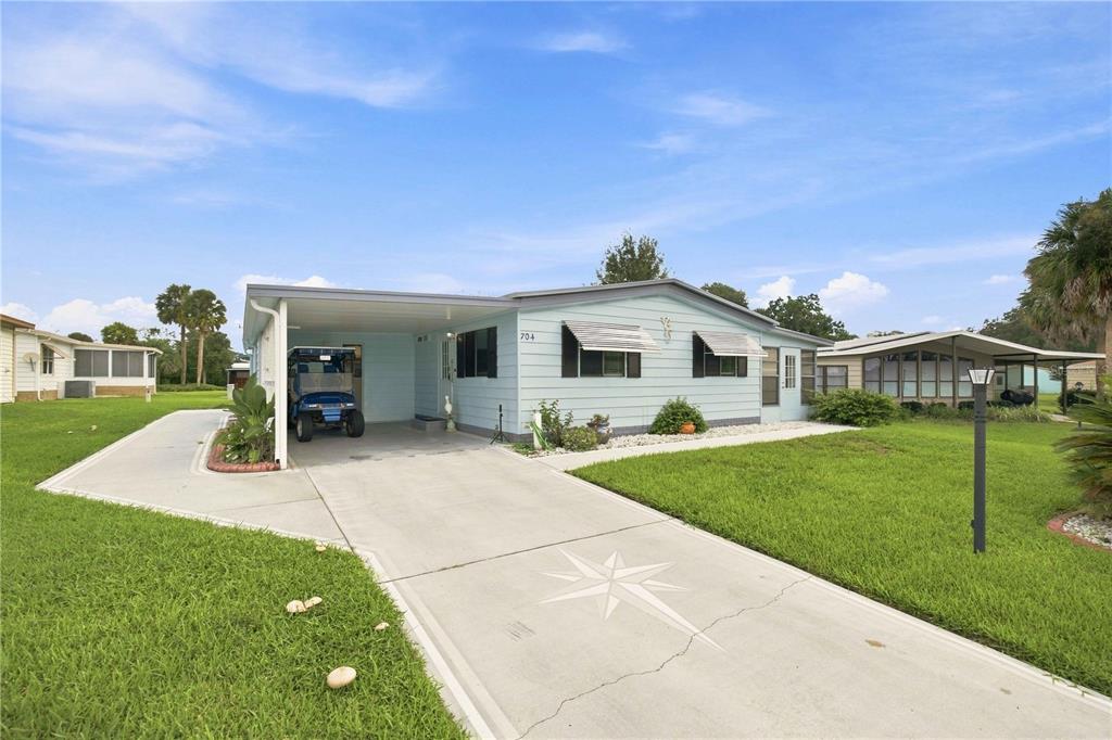 704 ROSEAPPLE AVENUE, LADY LAKE, FL — photo 2 of 30