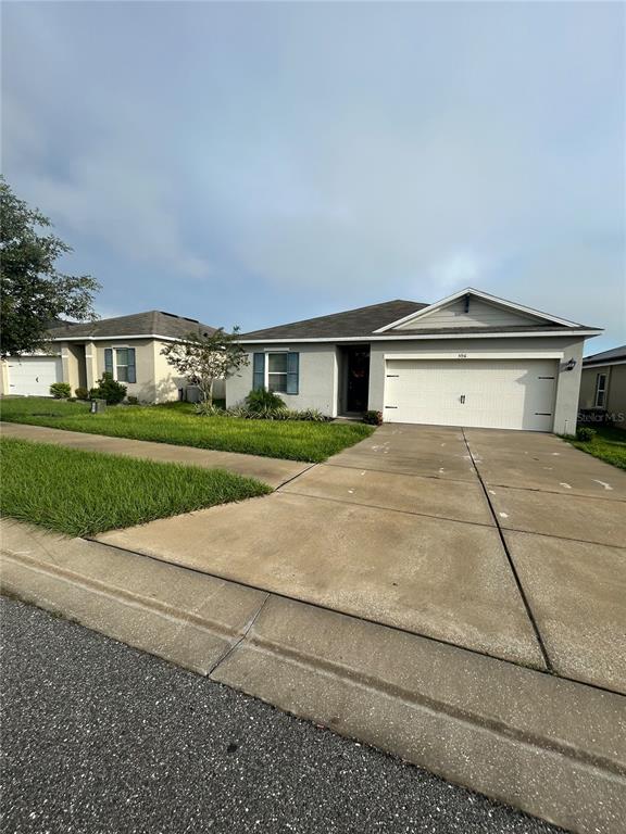 596 BOARDWALK AVENUE, HAINES CITY, FL — photo 2 of 32