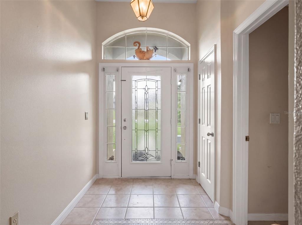 8014 CARDINAL WINDS LANE, MASCOTTE, FL — photo 3 of 30