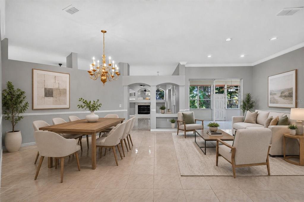 A kitchen with white cabinets, light countertops, tile flooring, and a ceiling fan — 2243 EAGLE BLUFF DRIVE, VALRICO, FL
