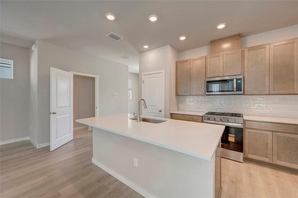 This is a floor plan of a residential second story featuring three bedrooms and two bathrooms — 2823 CRIMSON CAP STREET, ODESSA, FL