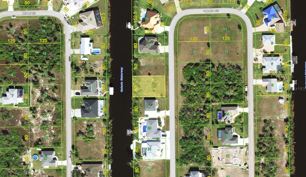 This is a map showing residential lots and a waterway in a suburban neighborhood — 9316 GALAXIE CIRCLE, PORT CHARLOTTE, FL
