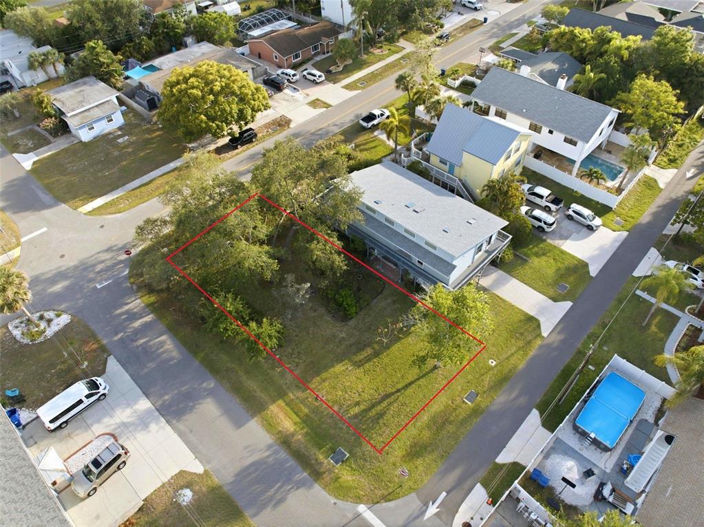 An aerial view shows a vacant, rectangular residential lot outlined in red between two streets — 0 GEORGIA AVE. AVENUE, CRYSTAL BEACH, FL