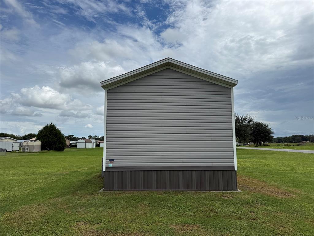 1129 NW 12TH LANE, LAKE PANASOFFKEE, FL — photo 3 of 25