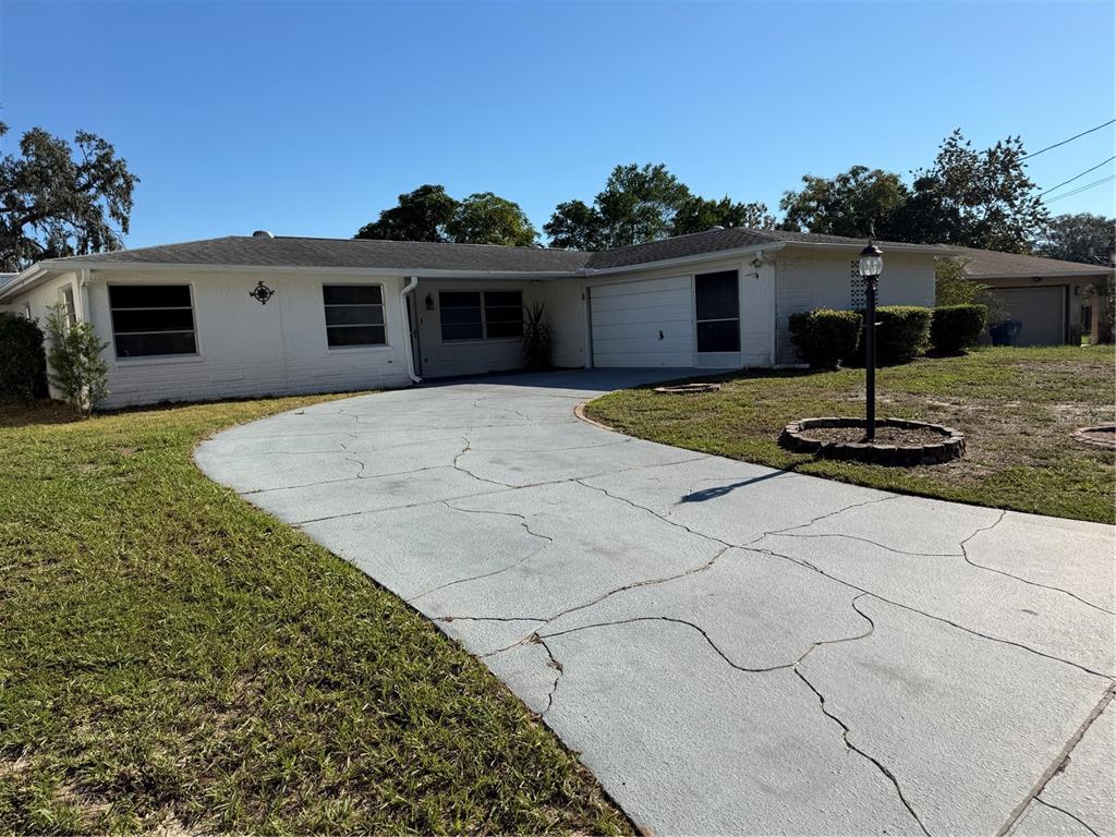 7400 HIAWATHA PARKWAY, SPRING HILL, FL — photo 3 of 26