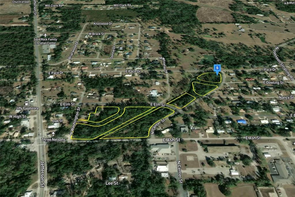 This is an aerial map showing a residential area with highlighted property boundaries — 400 E ELM STREET, PERRY, FL