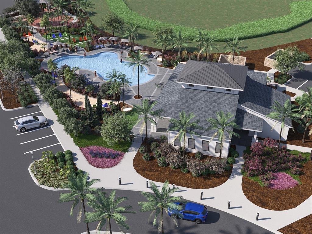 This is a rendering of a community clubhouse featuring a swimming pool and parking area — 13811 OWEN PRESERVE RUN, PARRISH, FL