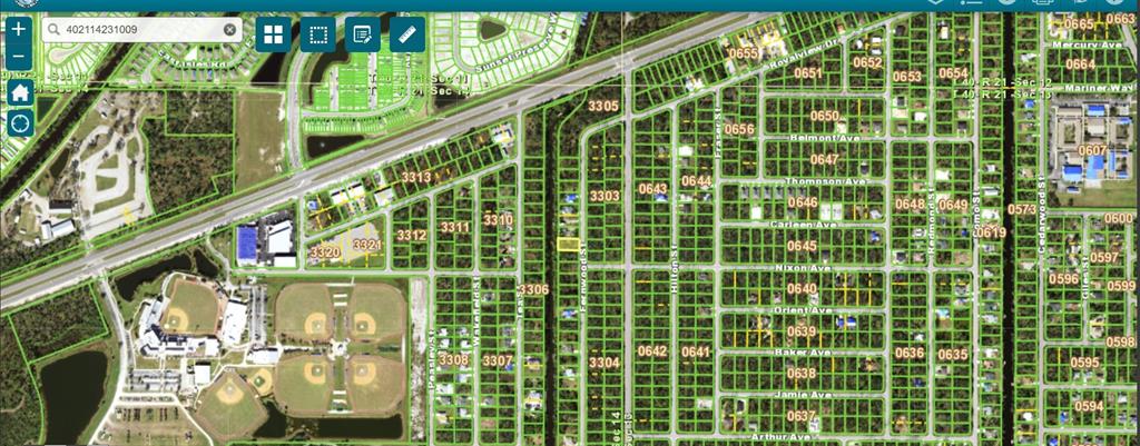 This is a satellite map view showing a residential neighborhood grid with highlighted property parcels — 2111 FERNWOOD STREET, PORT CHARLOTTE, FL