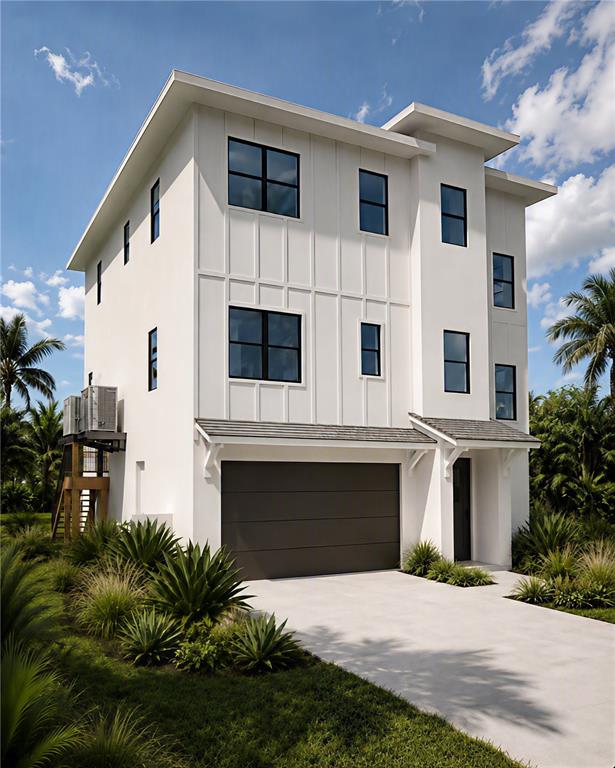 This is a rendering of a three-story white modern house with a two-car garage — 2614 QUINCY STREET S, GULFPORT, FL
