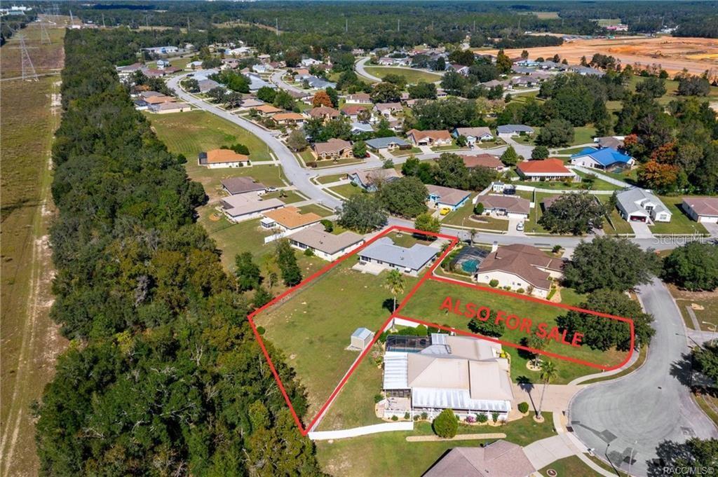 An aerial view shows two adjacent residential lots outlined in red within a suburban neighborhood — 1342 S BROOKFIELD DRIVE, LECANTO, FL
