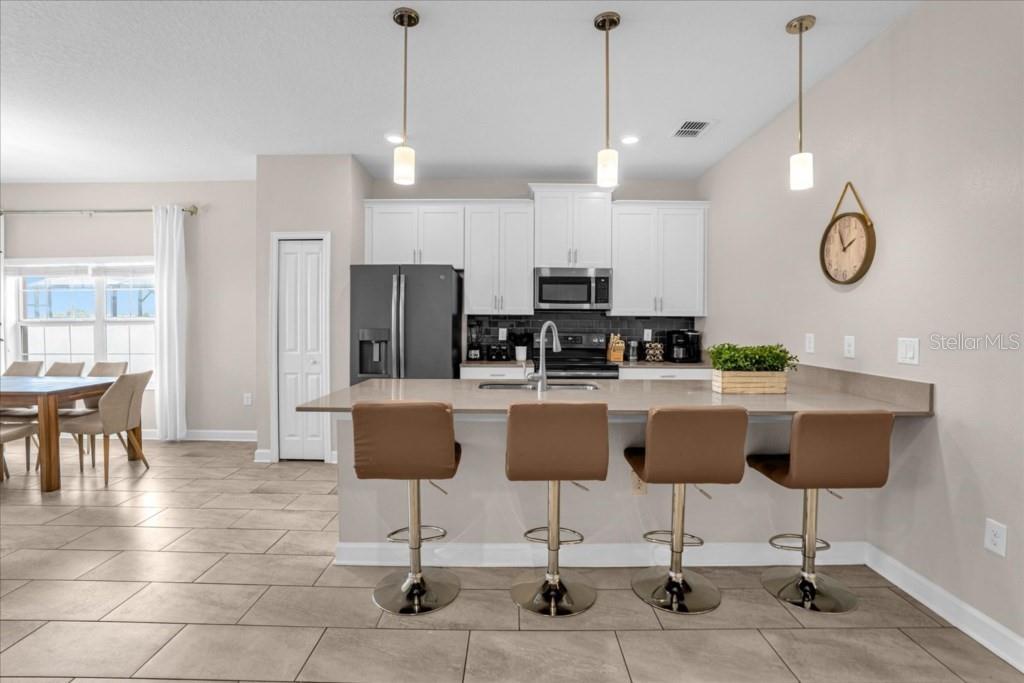 8997 STINGER DRIVE, DAVENPORT, FL — photo 4 of 27