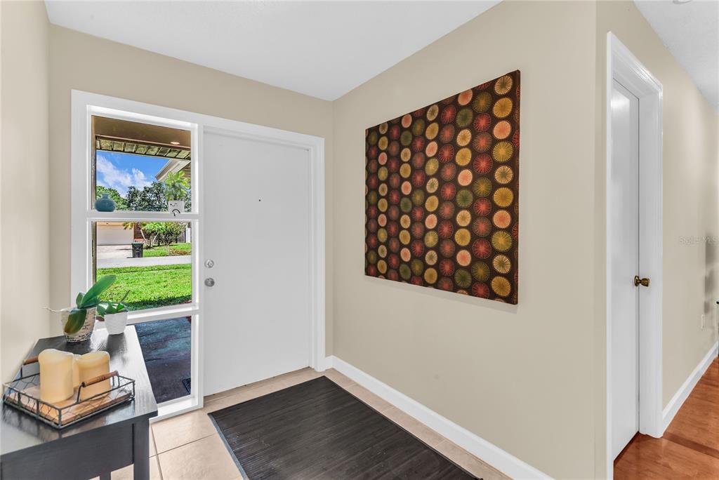 A single-story house with a brick facade, a two-car garage, and a front lawn — 8142 GOLDEN SANDS DRIVE, ORLANDO, FL