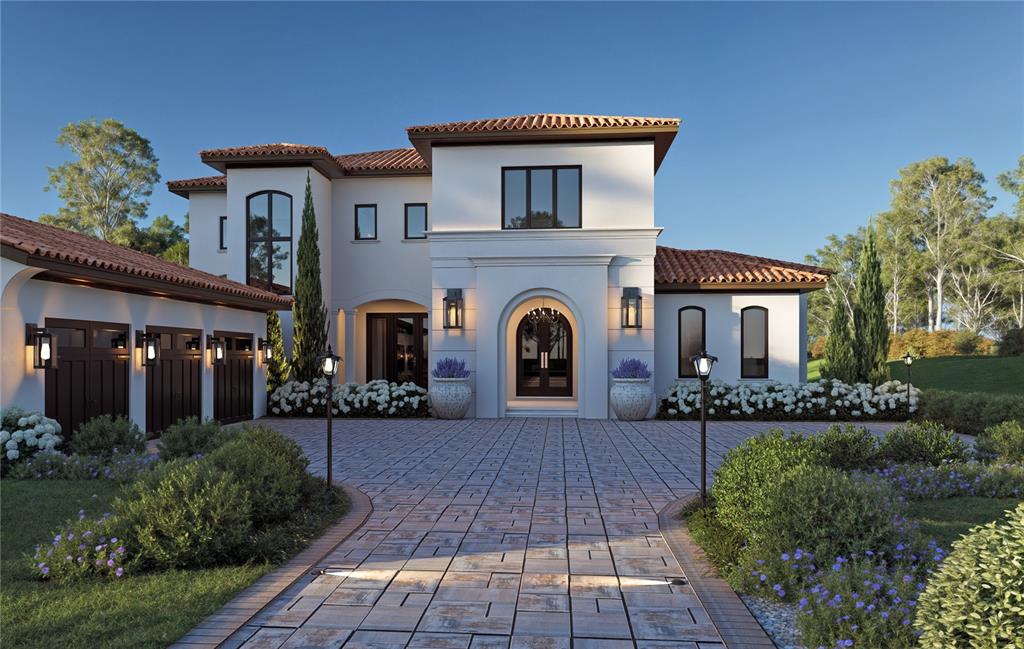 This is a rendering of a two-story Mediterranean-style house with a paved driveway and landscaping — 15016 PENDIO DRIVE, BELLA COLLINA, FL