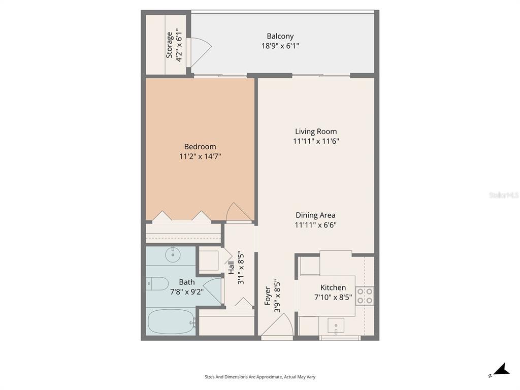 A view from a tiled entryway looking into a living area with a desk — 4705 5TH STREET W UNIT 305, BRADENTON, FL