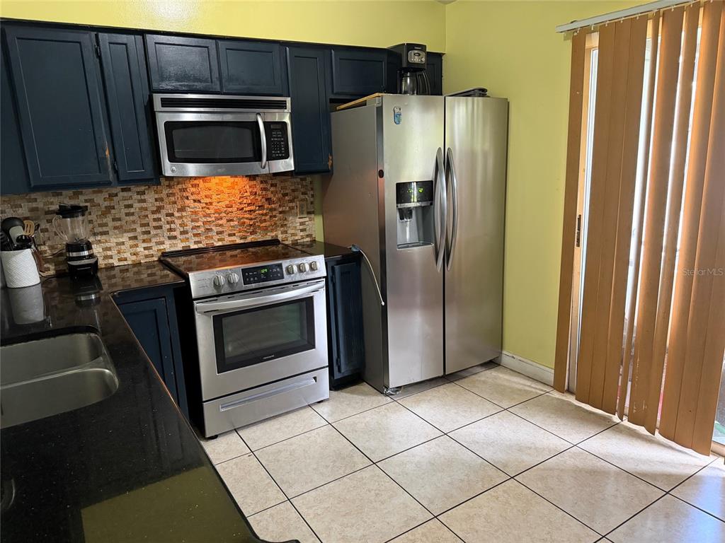 3227 CHESSWOOD AVENUE, KISSIMMEE, FL — photo 4 of 25