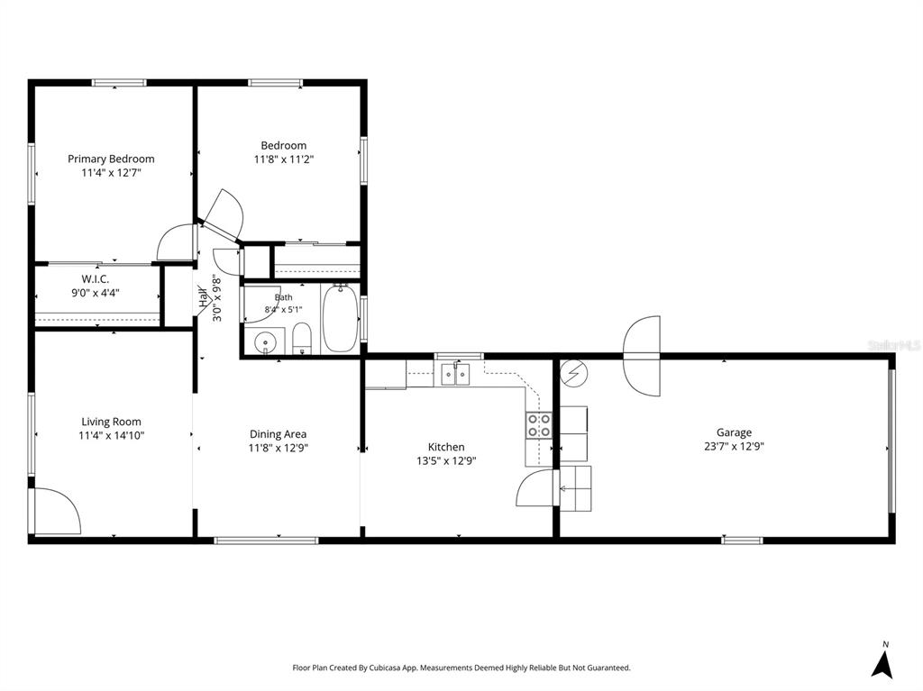 This is a floor plan showing a two-bedroom home with a garage and one bathroom — 4939 DR MARTIN LUTHER KING JR STREET N, ST PETERSBURG, FL