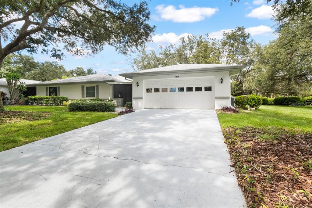 1613 LAUGHTON PLACE, SUN CITY CENTER, FL — photo 2 of 30