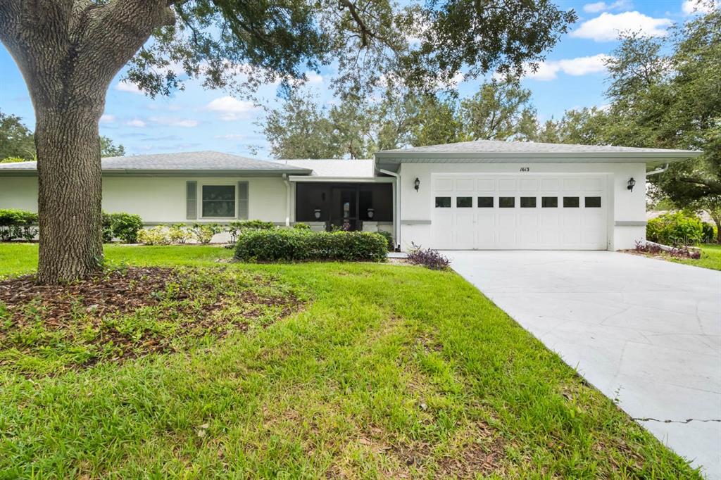 1613 LAUGHTON PLACE, SUN CITY CENTER, FL — photo 3 of 30