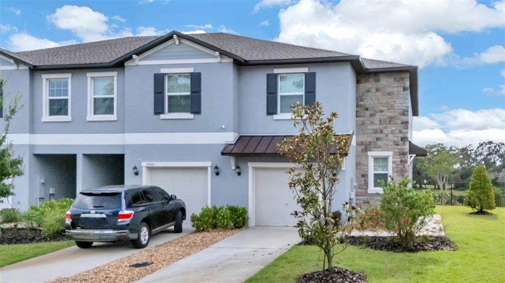 7002 RIPPLE POND LOOP, ZEPHYRHILLS, FL — photo 3 of 30