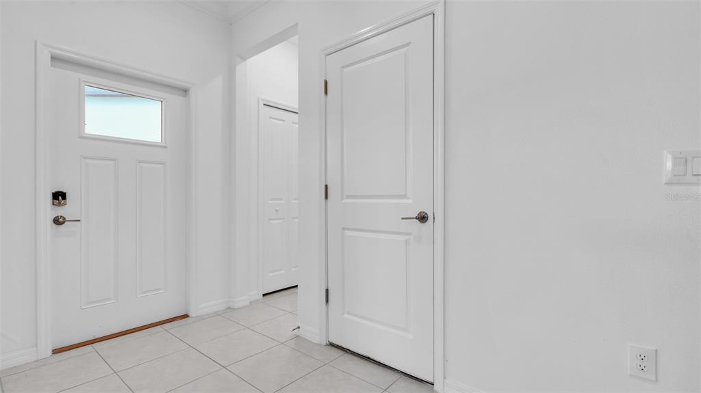 7002 RIPPLE POND LOOP, ZEPHYRHILLS, FL — photo 5 of 30