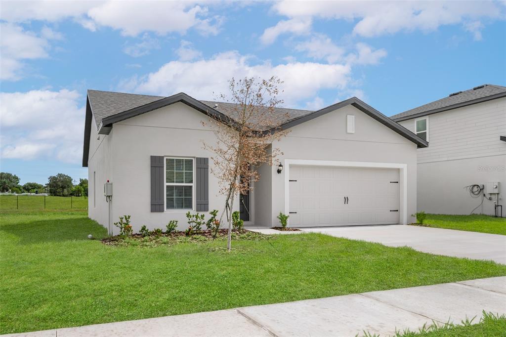 13355 TULA LOOP, ASTATULA, FL — photo 2 of 17