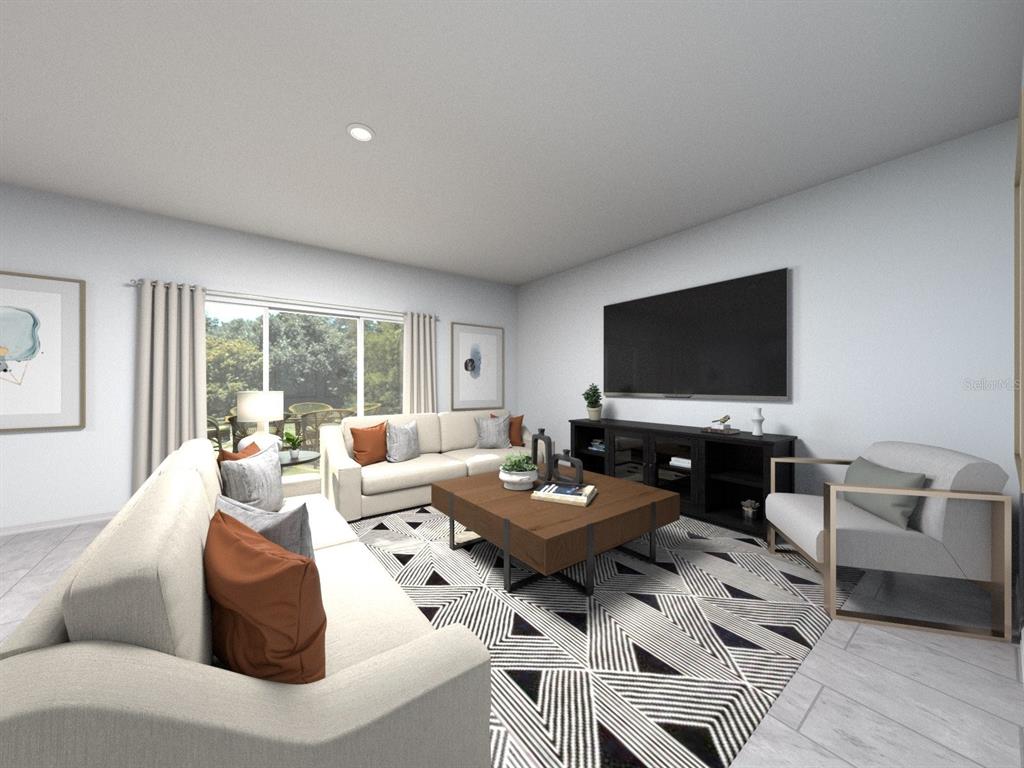 This is a digital rendering of a living room featuring a geometric rug and television — 3313 ORCHARD LOOP, BARTOW, FL