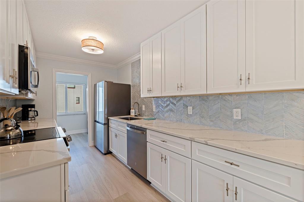 10265 GULF BOULEVARD UNIT A303, TREASURE ISLAND, FL — photo 5 of 22
