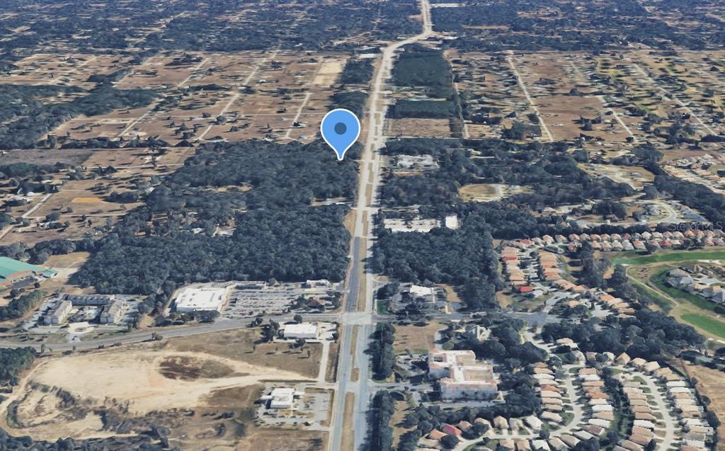 This is an aerial map view showing a residential area with a blue location pin — 161 W NORVELL BRYANT HIGHWAY, HERNANDO, FL