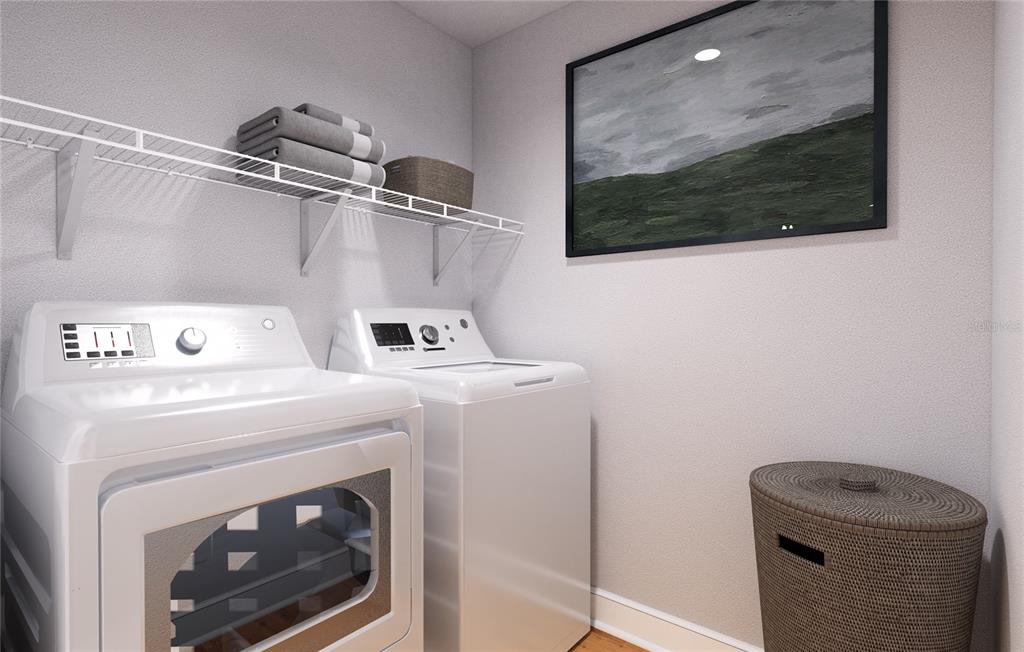 This is a rendering of a laundry room featuring white appliances, a wire shelf, and hamper — TBD GUAVA LANE, OCKLAWAHA, FL