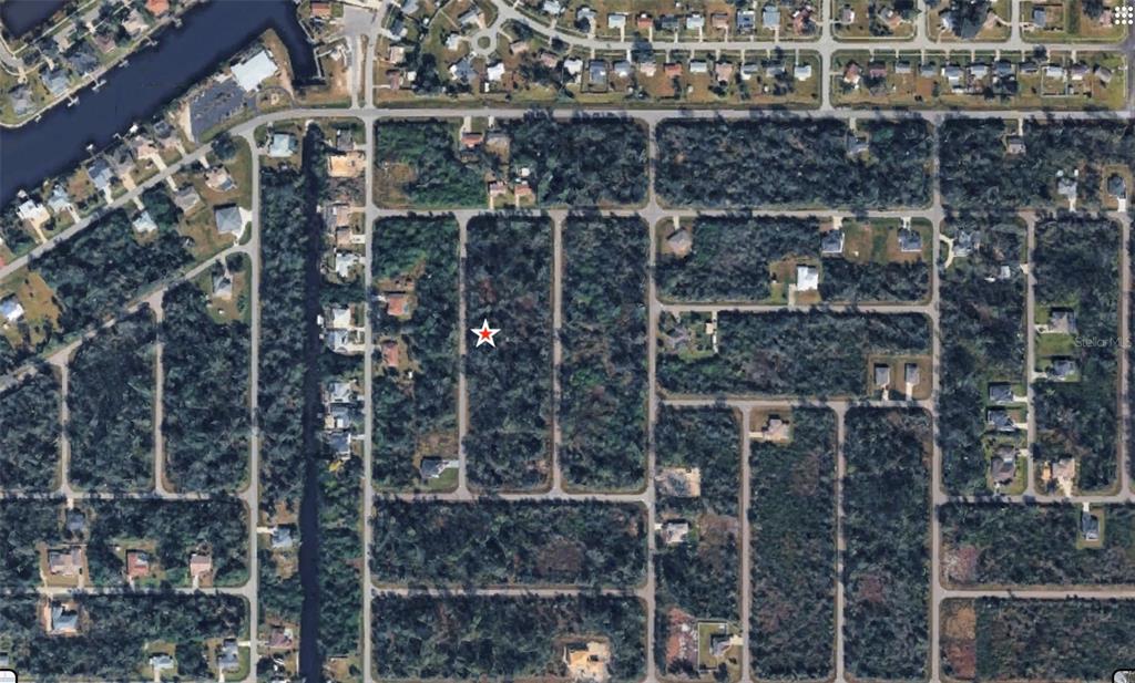 This is an aerial map view of a residential area with a red location pin — 72 POMPANO STREET, PORT CHARLOTTE, FL