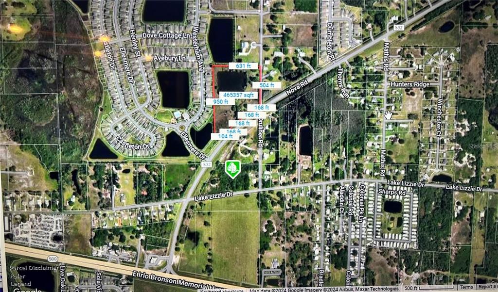 This is an aerial map showing a parcel of land outlined in red — 1888 DRULINER ROAD, ST CLOUD, FL