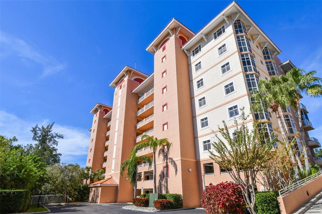 A sign for The Grande Veranda on the bay sits in front of a building — 12033 GANDY BOULEVARD N UNIT 151, ST PETERSBURG, FL