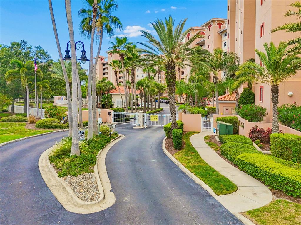 A white front door with a number 151 plaque sits beside a window — 12033 GANDY BOULEVARD N UNIT 151, ST PETERSBURG, FL