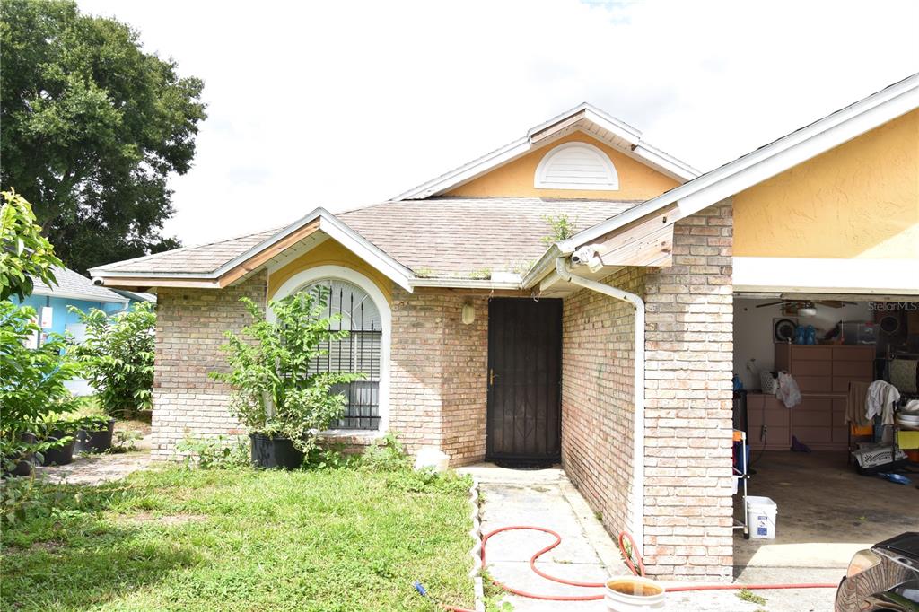 6587 MERITMOOR CIRCLE, ORLANDO, FL — photo 2 of 25