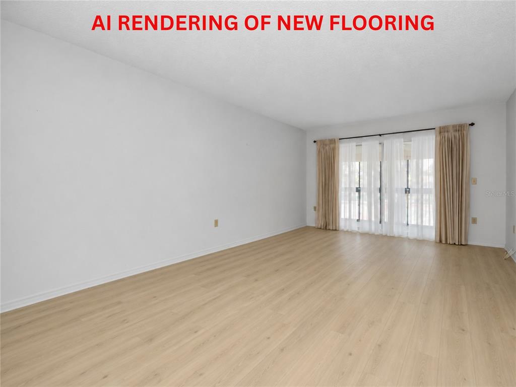 A two-story apartment building with a tiled roof and a parking lot in front — 9700 STARKEY ROAD UNIT 228, SEMINOLE, FL