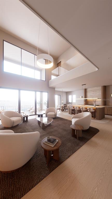 This is a rendering of a modern open-concept living room with high ceilings and neutral furniture — 817 BAY POINT DRIVE, MADEIRA BEACH, FL